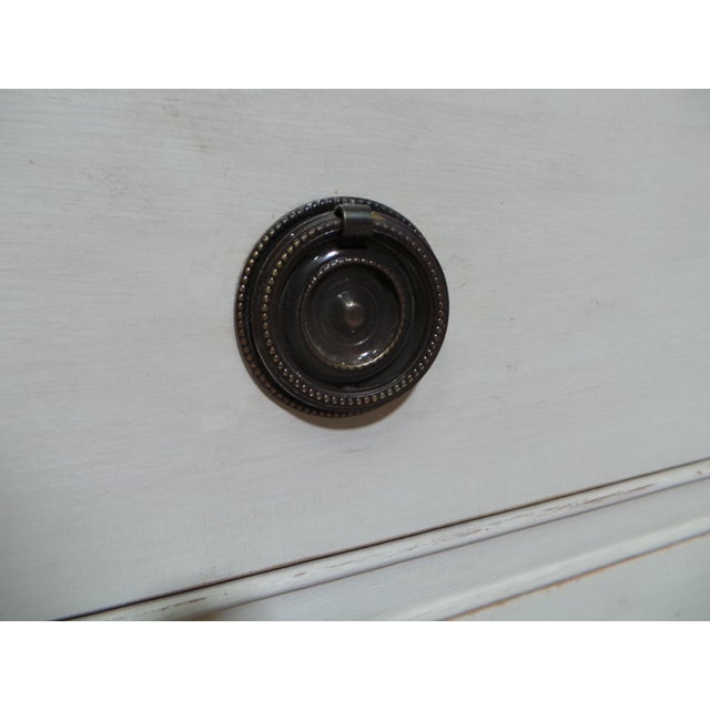 This is an unusual Gustavian style 8 drawer Dresser. its been restored and repainted with Milk Paints "Oyster White"