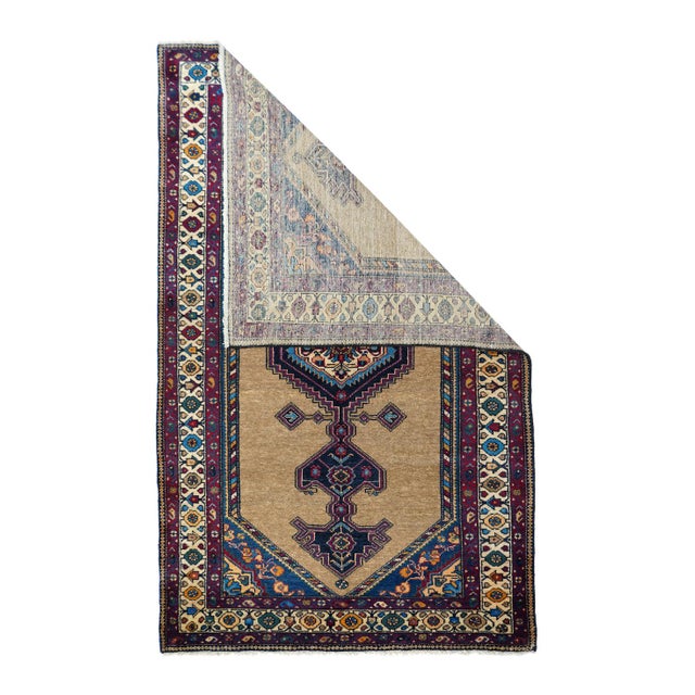 A very solidly made village Kurdish production with an open straw field displaying a complex central pole medallion with a...