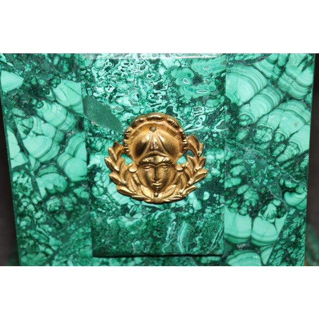 Dimensions: 39 inches high x 9 inches wide x 9 inches deep. Truly outstanding palatial pair of Empire style malachite and...