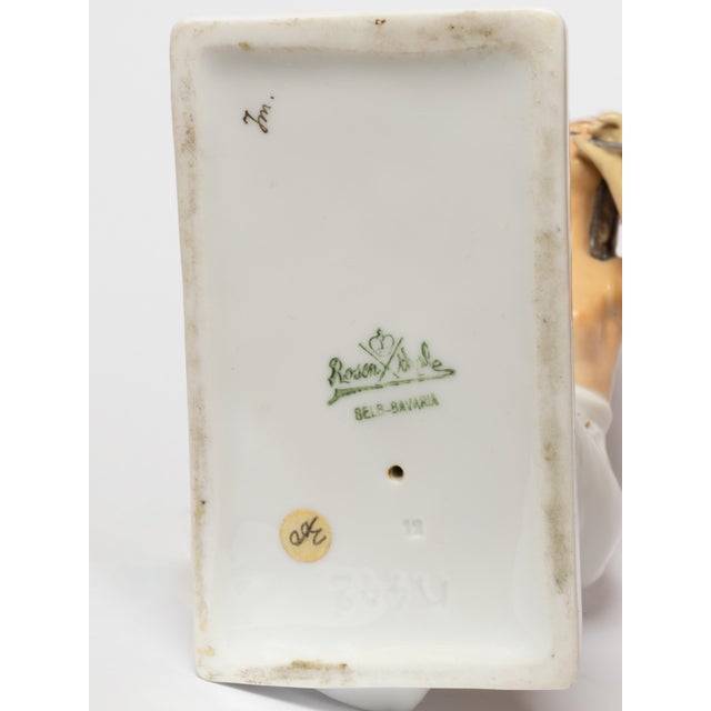 A rosenthal porcelain figure of a snake charmer, after model by berthold boesz, pattern nr k442. bibelot in the shape of...