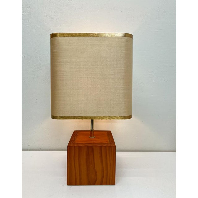 Very nice Tarogo table lamp designed and produced in Japan in the 1980s. Teak wood base and cream colour lampshade with...