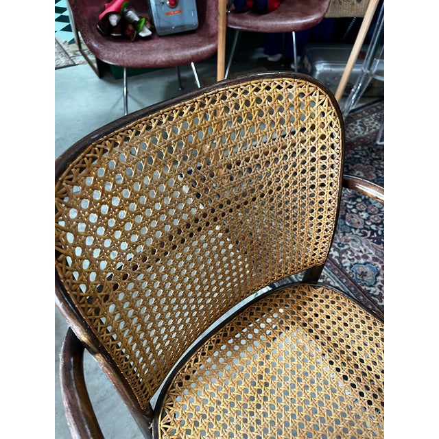 Up for consideration is a beautiful vintage Prague model wooden and caned accent chair. This would look lovely in your...