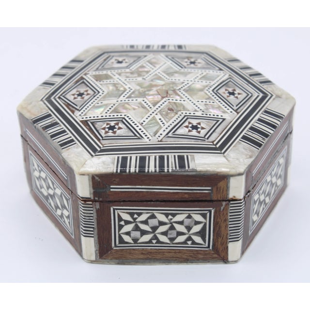 This is stunning Vintage Hexagon Handmade Inlaid Mother of Pearl Jewelry Box. This is a handcrafted jewelry box composed...