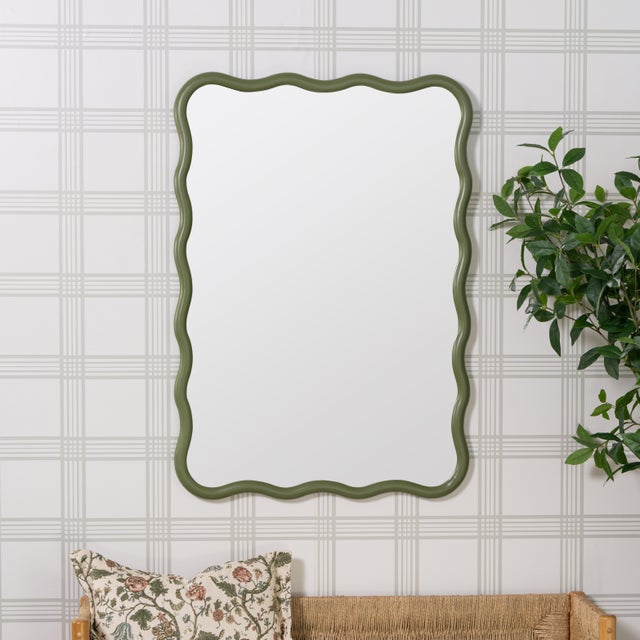 The Candace Sage Wisdom mirror features a rich sage green painted wood frame with a warm, earthy tone that brings grounded...