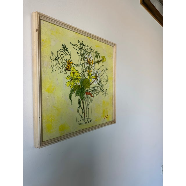 Charming and vibrant, this 1970s vintage Impressionist still life captures a delicate bouquet of wildflowers arranged in a...