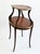 Elevate your space with this vintage French Louis XV style two-tier étagère table, an exquisite blend of fine artistry and...