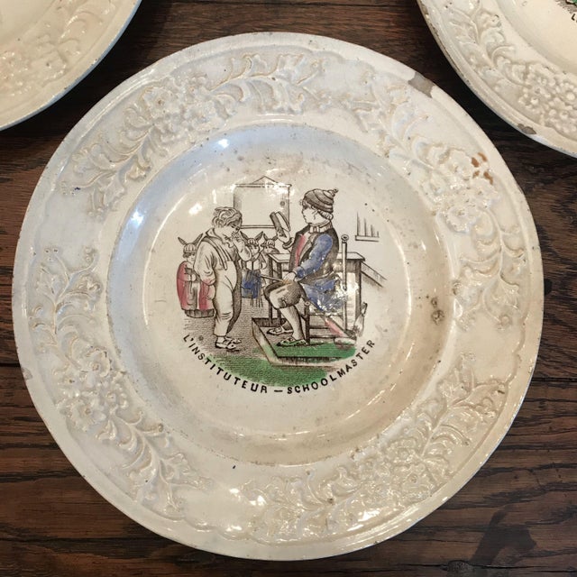 Ceramic Set of Three French Early 1800s Century Plates: Flowers, Boatmen, Dandies and Schoolmaster For Sale - Image 7 of 9