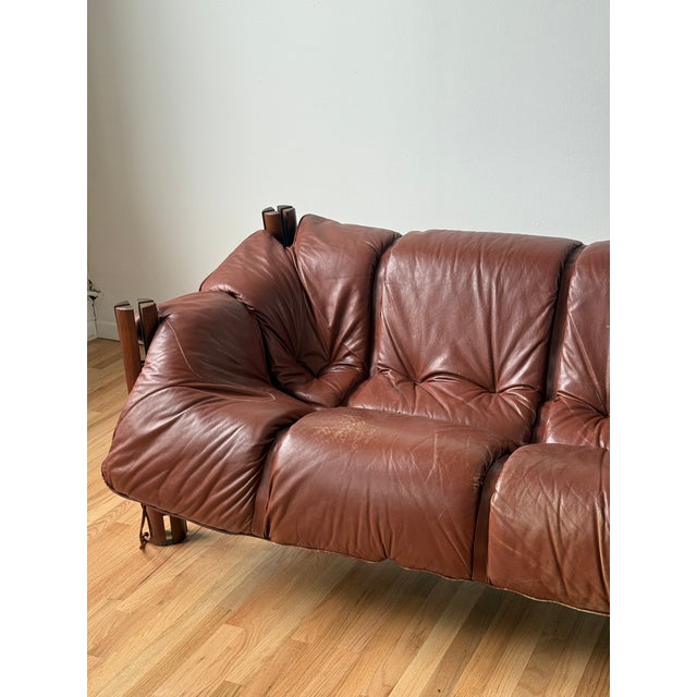 Vintage Percival Lafer MP-211 sofa from the 1970s, crafted in Brazil and celebrated for its iconic sculptural silhouette...