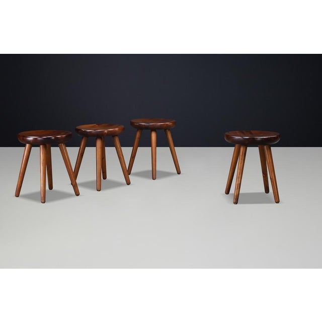 Authentic French mid-century stool crafted from solid beech wood with warm stained finish, France, 1960s. This authentic...