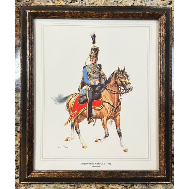 This fabulous framed print from the 1960s showcases the military dress uniform of a cavalry officer of the 1800s, the...