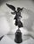 Immerse yourself in the timeless beauty of this magnificent bronze sculpture depicting the "Winged Victory" from the Grand...