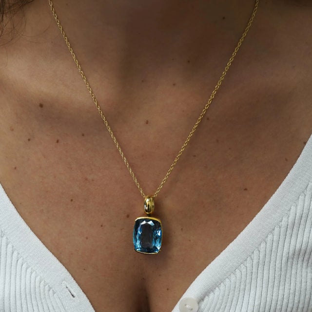 18K Yellow Gold Cushion Cut Blue Topaz Pendant Necklace - GIA Certified GIA-certified blue topaz pendant featuring...