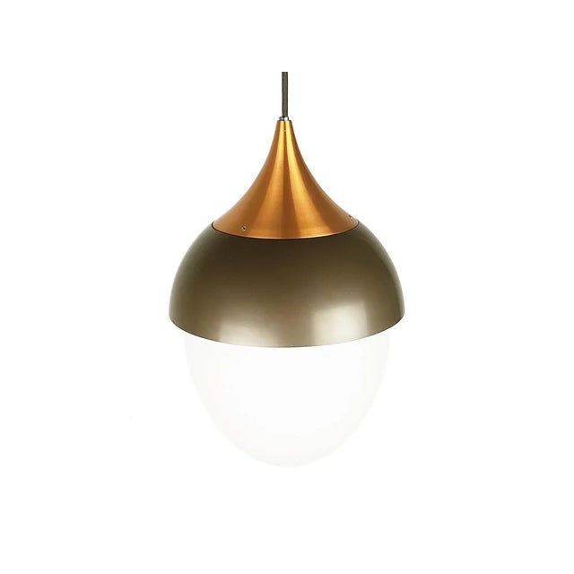 A rare and elegant pendant lamp produced by Stilnovo in the 1960s.The main body of the lamp consists of 3 elements: 2 in...