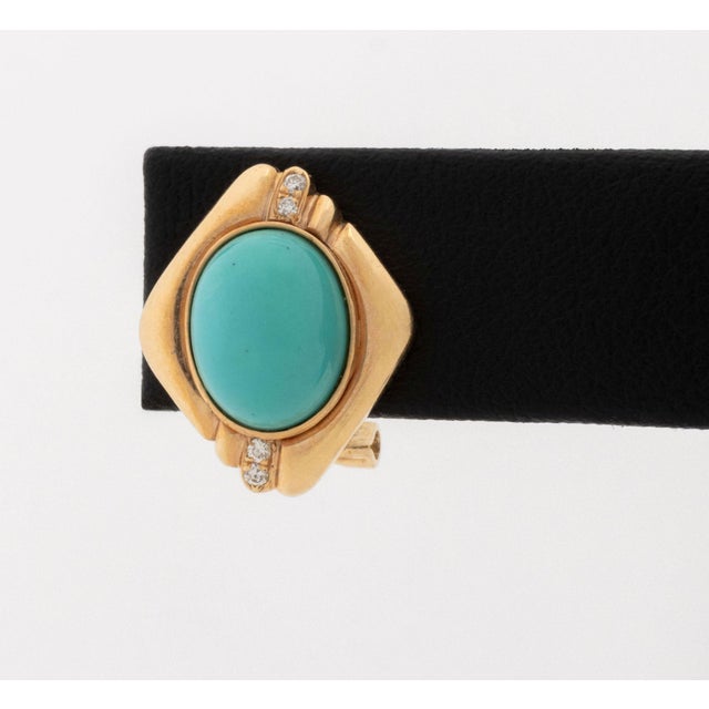 14K Yellow Gold Turquoise Diamond Earrings, featuring two bezel set oval turquoise cabochons weighing a total of approx....