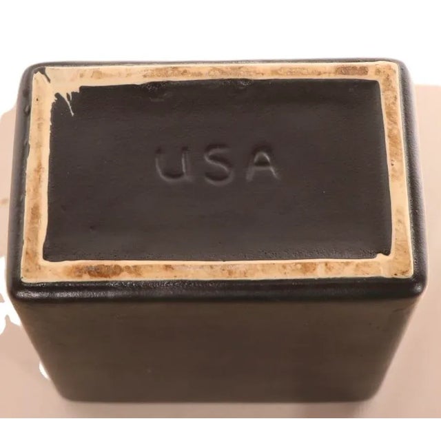 Minimalist Mid Century U S A pottery pillow, slab form vase in flat black glaze. This example is in very fine, original,...