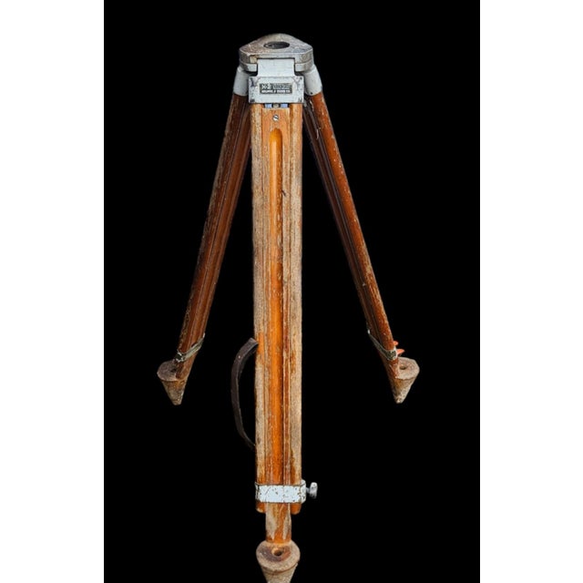 Elevate an industrial loft, studio, or modern living space with this exceptional mid-century surveyor’s tripod. Crafted...