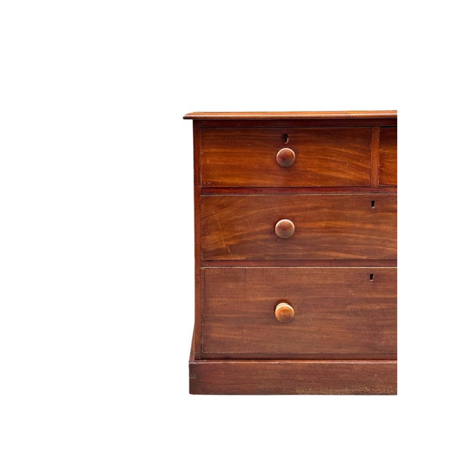 Victorian English chest of drawers, circa 1870, made of mahogany, with four drawers: two small ones at the top and two...