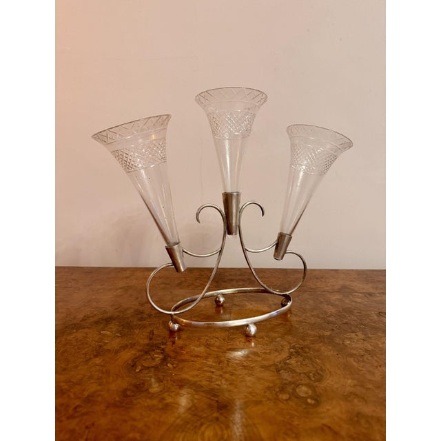 Lovely quality antique Edwardian epergne, having a lovely quality antique Edwardian epergne with a shaped silver plated...