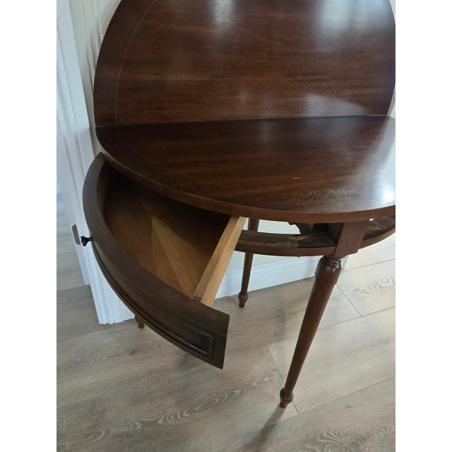 Mahogany Sheraton Tilt Top Card Table This is a beautiful Mahogany tilt top card table that comes with two swing action...