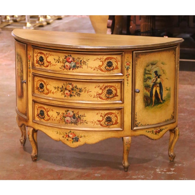 This elegant antique commode was crafted in Italy, circa 1950. Built in a classic bombe form, the serpentine façade...