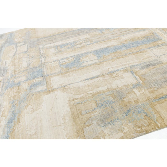 Enhance your living space with this modern abstract rug, crafted from a premium blend of wool and nylon. Its distressed...