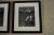 Unique pair of large English photographs of a father and son boxing in a simple black wide gallery frame. 25.25" x 29.25"...