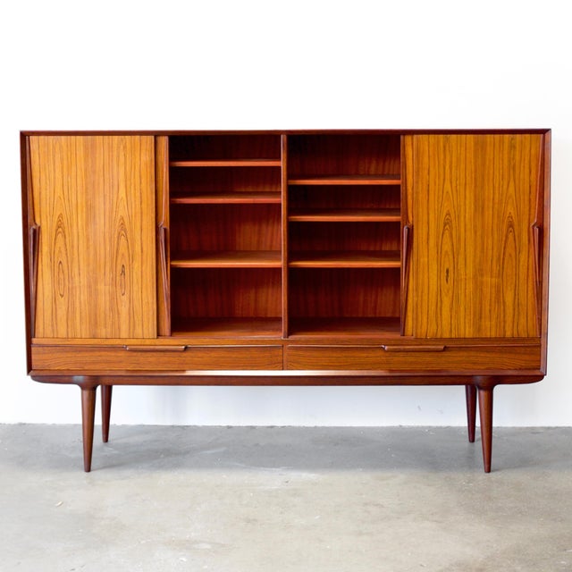 Dimensions: 70 7/8" W x 18" D x 47 1/4" H Origin: Denmark Designer: Gunni Omann Manufacturer: Omann Jun. Møbelfabrik Year:...