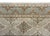 A stunning early 20th century Persian Kashan rug with an all-over floral trellis pattern with densely woven flowers,...