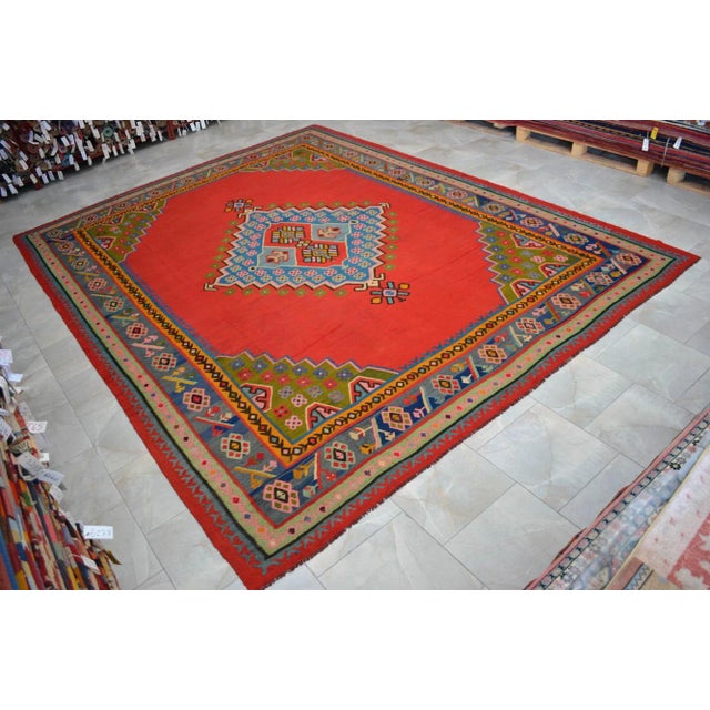 Offered is a Turkish Oushak kilim with a beautiful floral medallion pattern. Unique Antique kilim, truly one of a kind....