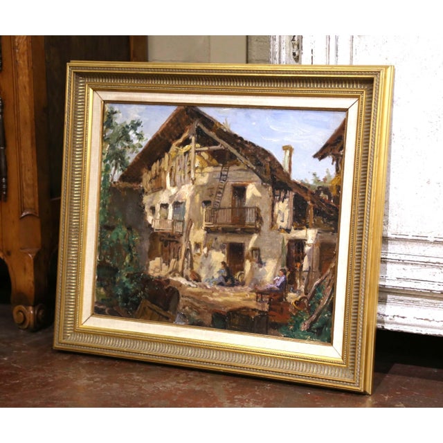 Richly textured and full of rustic character, this antique French village scene is an original oil on canvas by Paul...