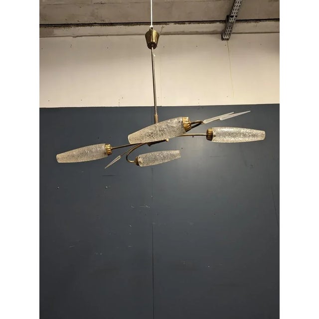 Chandelier in the style of Arlus, 1970s, in Very Good conditions. Up to 250V (Europe/UK Standard).The wiring of this item...