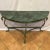 French vintage wrought iron with with a verdigris bronze finish demi-lune console table from the mid 20th century, This...