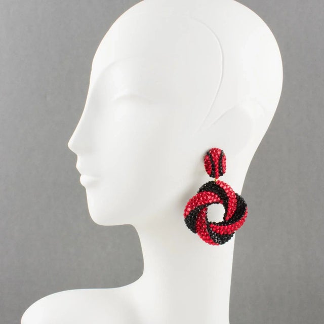 This is part of Chairish’s Costume Jewelry assortment. Adorable statement clip-on earrings designed by Richard Kerr in the...