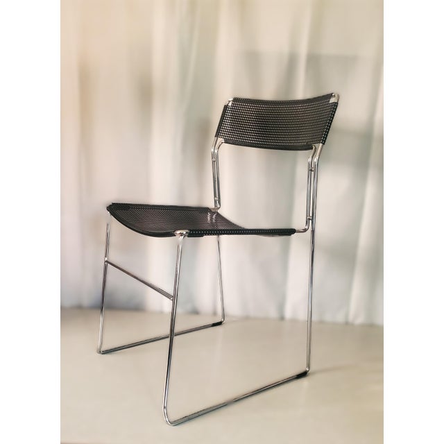 Stackable metal mesh dining chair by Arrben Italy c. 1980. Slim chromed steel spaghetti frame with perforated steel seat...
