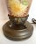 Here is a one-of-a-kind lamp that was hand-painted with a stunning, colorful floral bouquet. The flowers are a...