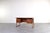 A Danish desk designed by Svend Åge Madsen for H.P. Hansen, created in the 1960s. The desk is crafted from teak, a...