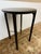 Design Plus Gallery presents a Sculptural Side Table of Walnut Wood and Brass Accents. The table offers a cradled tabletop...