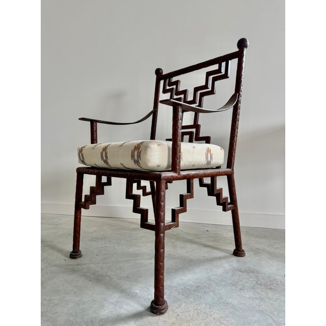 Single heavy, steel, custom-made arm chair with heavy ziggurat-detailing. The chair is perfect as a desk chair and doubles...