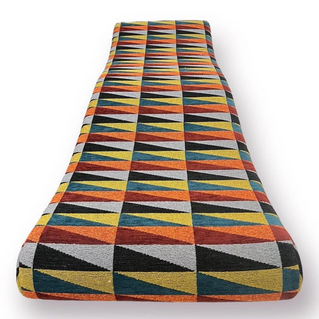 Bold and colorful rainbow wave bench, quintessentially 80s, evoking a sense of nostalgia for the bygone era. The abstract...
