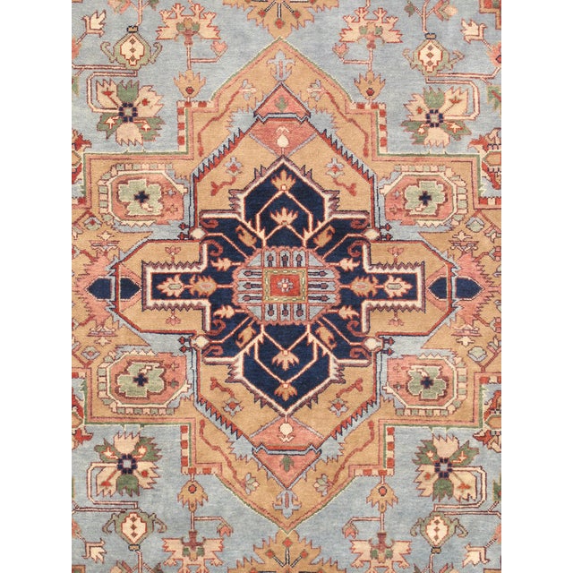 The Serapi Collection reinterprets traditional tribal geometric design through a refined palette. Each rug is hand-knotted...