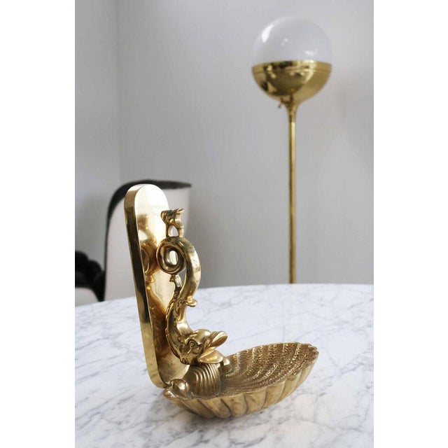 Probably a pompous soap shell. Can also be used as bird drinks due to the size. Hollywood Regency. An extraordinary and...