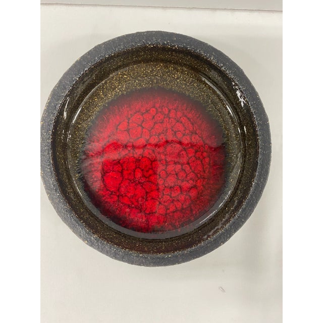 Vintage Danish Pottery Dish with a vibrant red enamel center. Løvmose Denmark embossed on bottom.