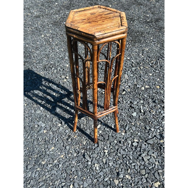 Organic rattan and bamboo small 6 sided vintage side table or plant stand.