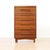 This elegant pair of mid-century teak tallboy chests by White &amp; Newton beautifully exemplifies the clean lines and...