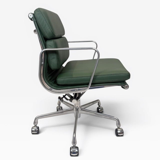 A beautifully restored Eames Aluminum Group Soft Pad Management Chair, originally designed by Charles & Ray Eames....