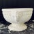 Vintage circa late 1940s Wedgwood pedestal centerpiece bowl featuring elegant ram’s head handles and refined embossed...