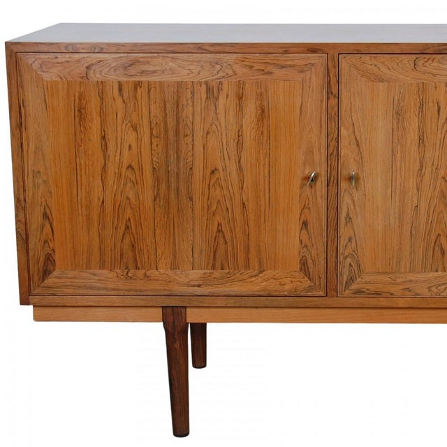 Arne Vodder sideboard of rosewood from the 1960s. The sideboard appears in good condition but it has been slightly...