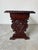 Striking vintage Italian Renaissance-style coffee table or bench, crafted from solid wood and richly detailed with deep,...