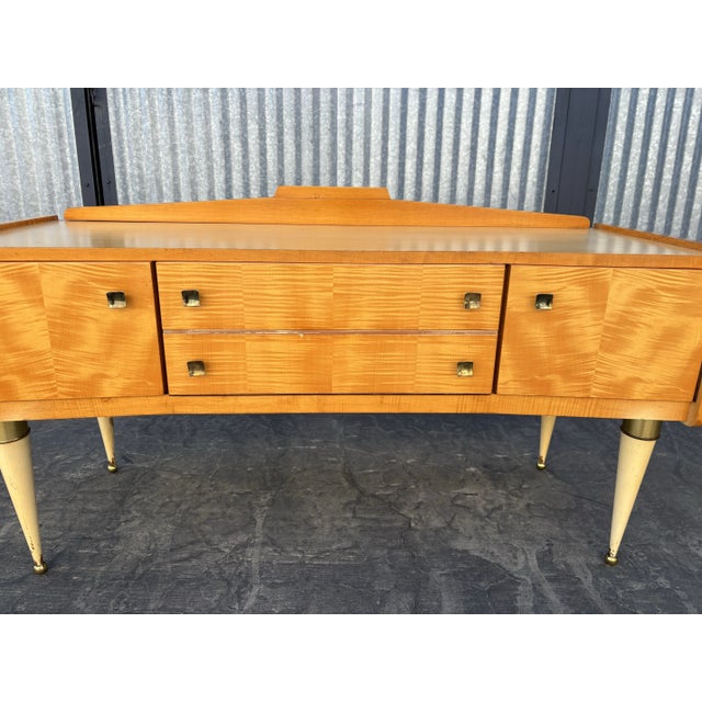 Elegant little dressing table in sycamore with possible lemon tree veneer. It has two side doors and 2 faux drawers that...