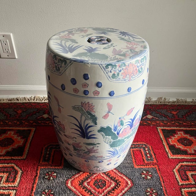 Chinoiserie garden stool in pastel colors. Indoor/outdoor Dimensions 12" diameter x 18"H